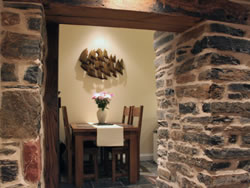 Kingston lodge - Dining table and kitchen view