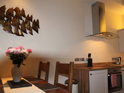 Kingston lodge in Orkney - dining table and kitchen
